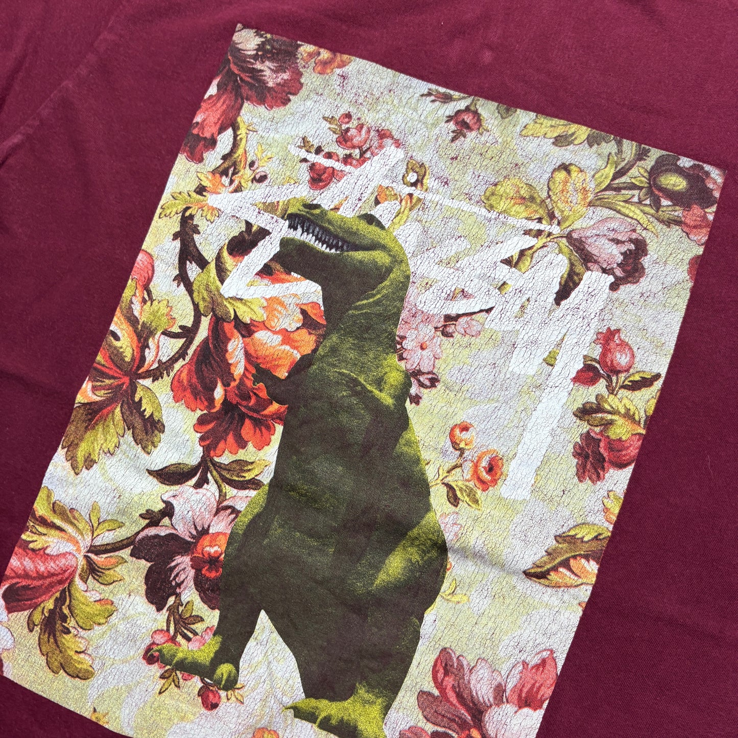 Vintage Stussy Dinosaur Burgundy Graphic T-Shirt - XS