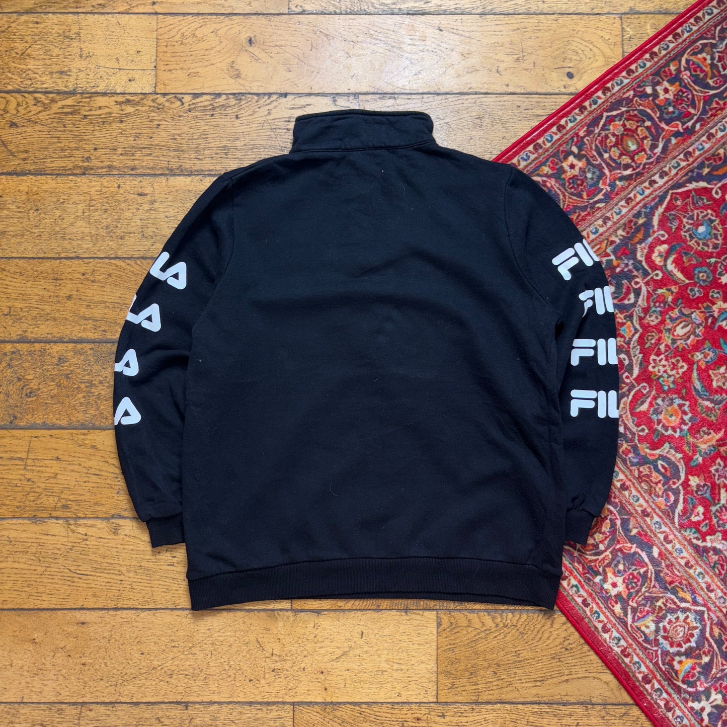 Vintage Fila. Black Quarter Zip Sweatshirt - S