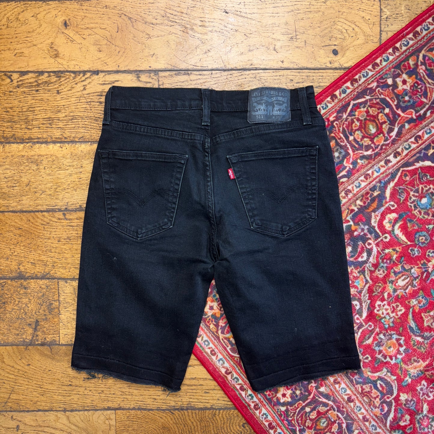 Vintage Levis 511 Slim Black Denim Shorts - 31