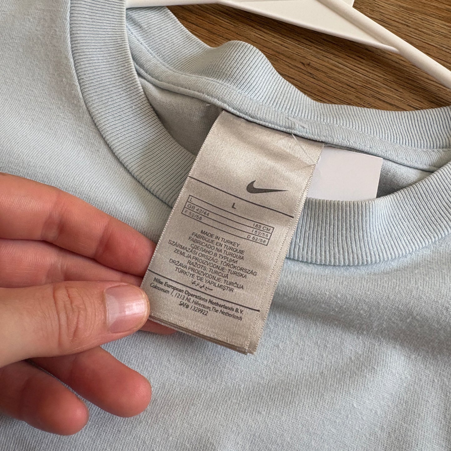 Vintage Nike Light Blue Y2K Swoosh Graphic T-Shirt - L