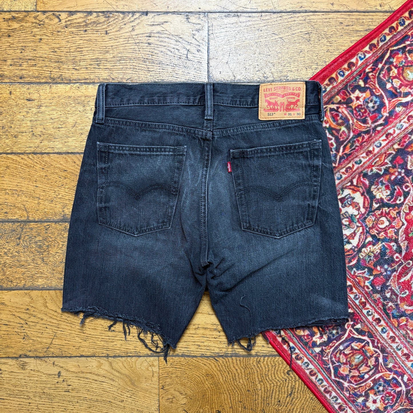 Vintage Levis 513 Black Slim Denim Shorts - 31