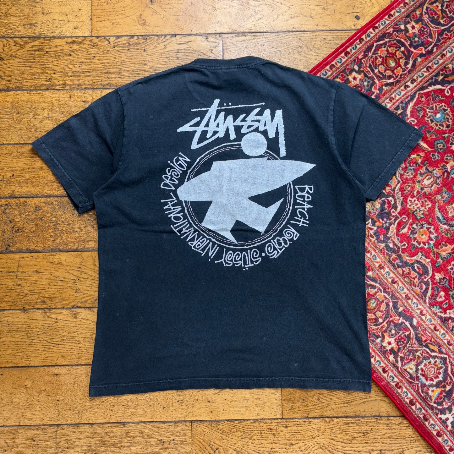Vintage Stussy Faded Black Surfwear Graphic T-Shirt - L