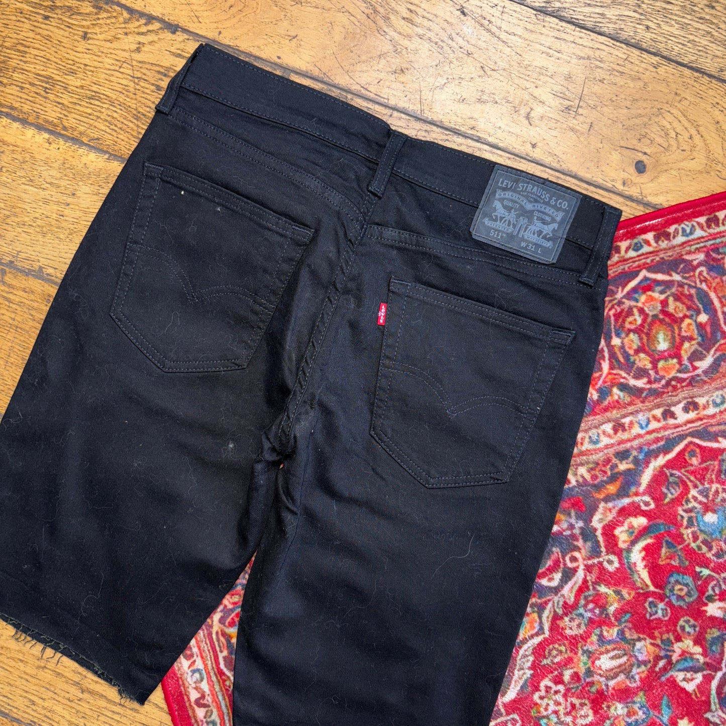 Vintage Levis 511 Slim Black Denim Shorts - 31