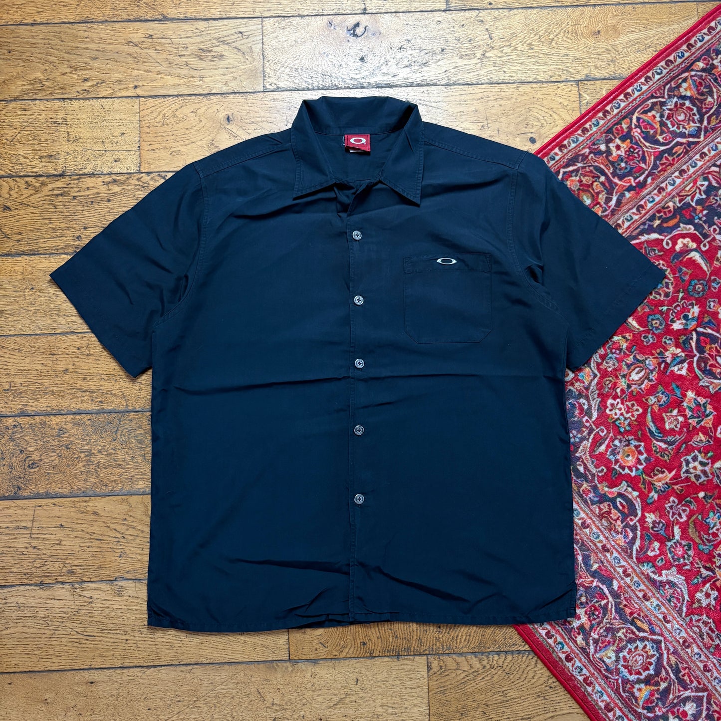 Vintage Oakley Black Metal O Short Sleeve Shirt - L